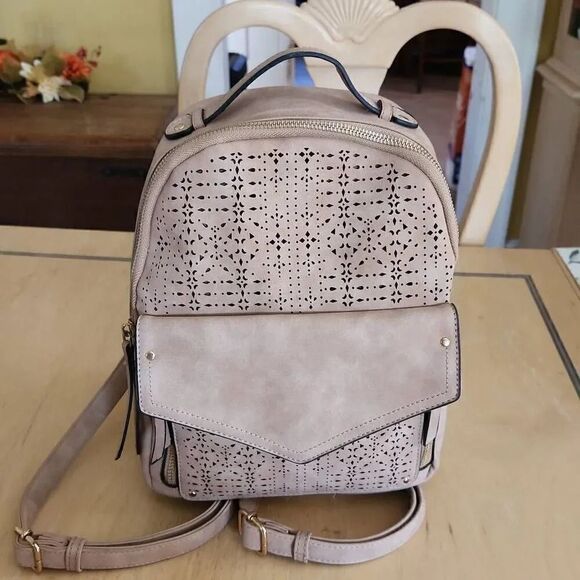 Tan women's backpack laser cut detail - Picture 1 of 7